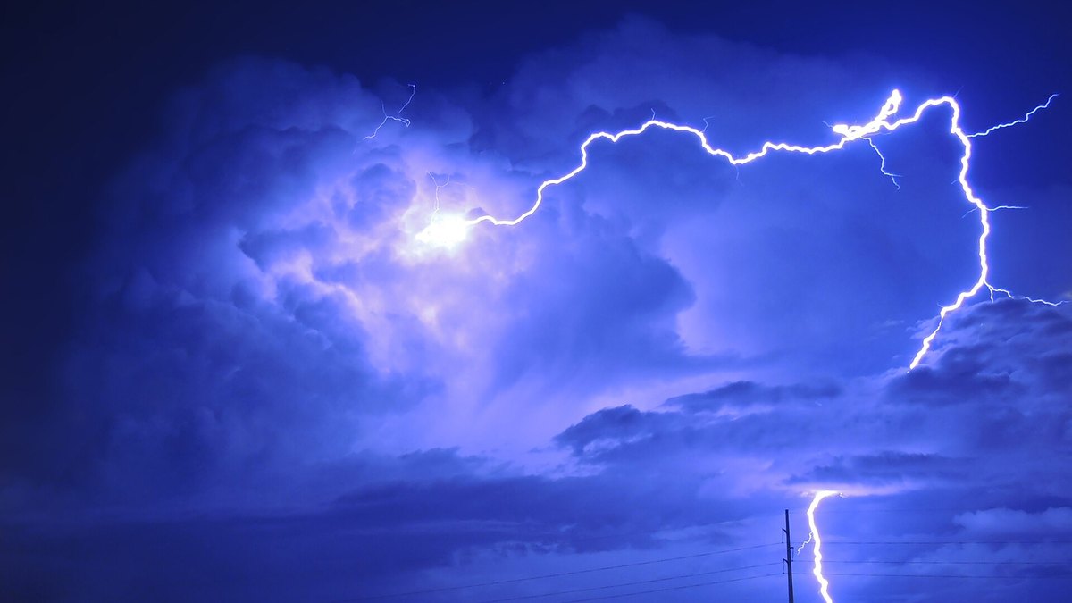 Lightning branching across the night sky over Dallas — the electrical events behind every human thought, PUNDERVERSE by Panacea Bio Chem
